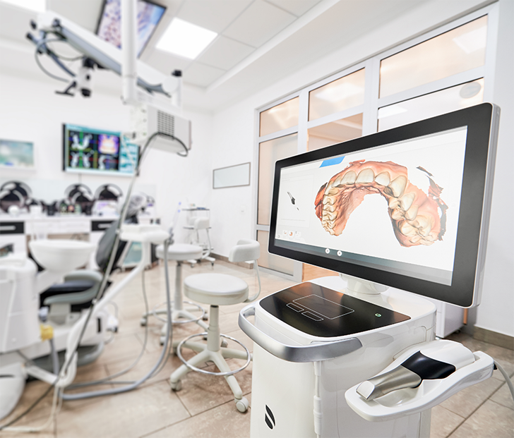 Render of teeth on monitor in a dental office