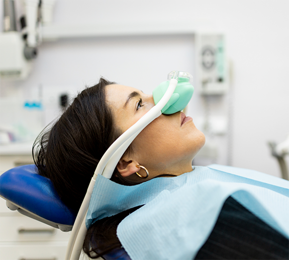 Child with mask over nose for nitrous oxide sedation