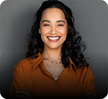 Woman in orange shirt smiling